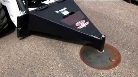 Tri-State Bobcat Super Scraper attachment!  Scrape away packed-on or built up materials!