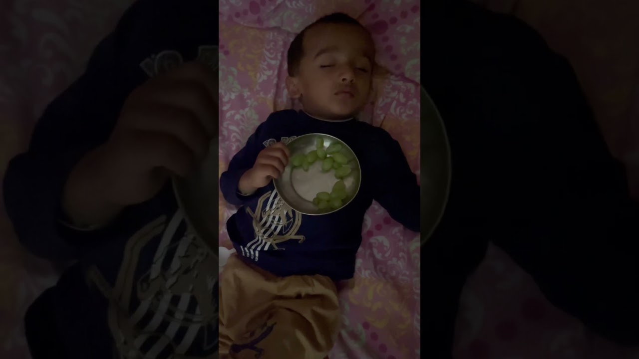 Aadi eating grapes 🍇 while sleeping 😂😂 