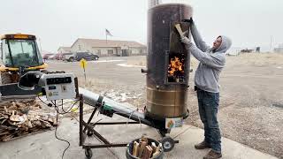 Startup and loading of the Continutiki biochar stove by High Plains Biochar.