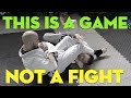 BJJ players playing the game of BJJ