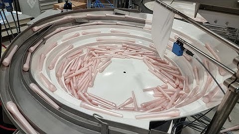 Bowl Feeder feeds and orientates Catheter Cases | RNA Automation