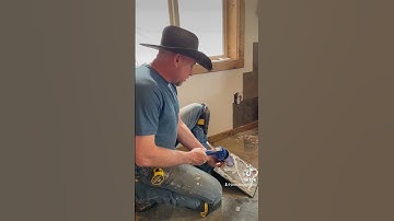 Slate installation behind wood stove as heat shield #joshbailey #alaska #slateinstallation #diyslate