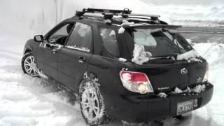 Subaru, Snow Tires, and a Slick Driveway