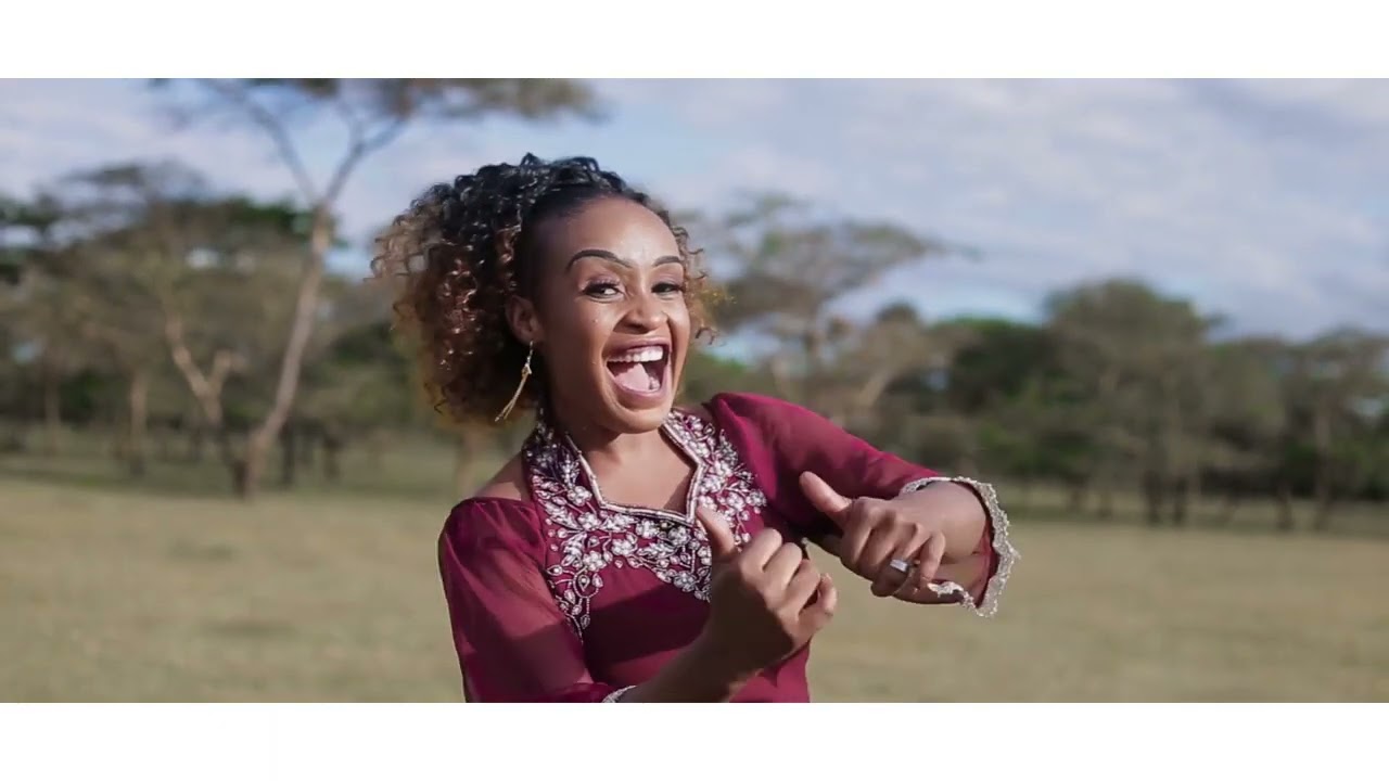 UFUMU WA KUMWAMBA new video by Eliza Elias ft Miracle Chinga mpulunya