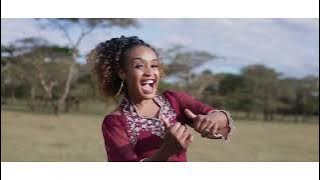 UFUMU WA KUMWAMBA new video by Eliza Elias ft Miracle Chinga mpulunya