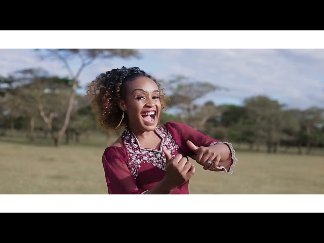 UFUMU WA KUMWAMBA new video by Eliza Elias ft Miracle Chinga mpulunya class=