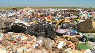 The Environment, Garbage Dump, #8 And Compactor Pan . Stock Footage