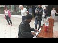 Boogie woogie piano players leave shoppers stunned