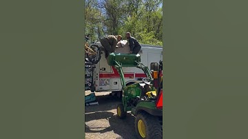 Using the John Deer for our new air conditioner install.