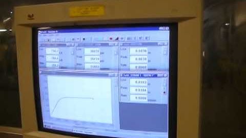 Tinius Olsen 60,000# Super L Tensile Strength Testing machine in operation