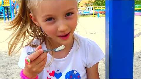 Polina playing cooking with toy Kitchen. Funny breakfast with baby dolls