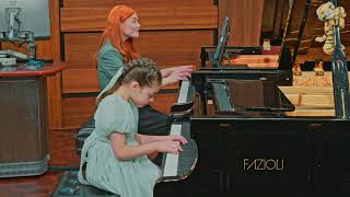 7 year old Maya playing Mozart Concerto no 23 with her teacher Kym Corridan