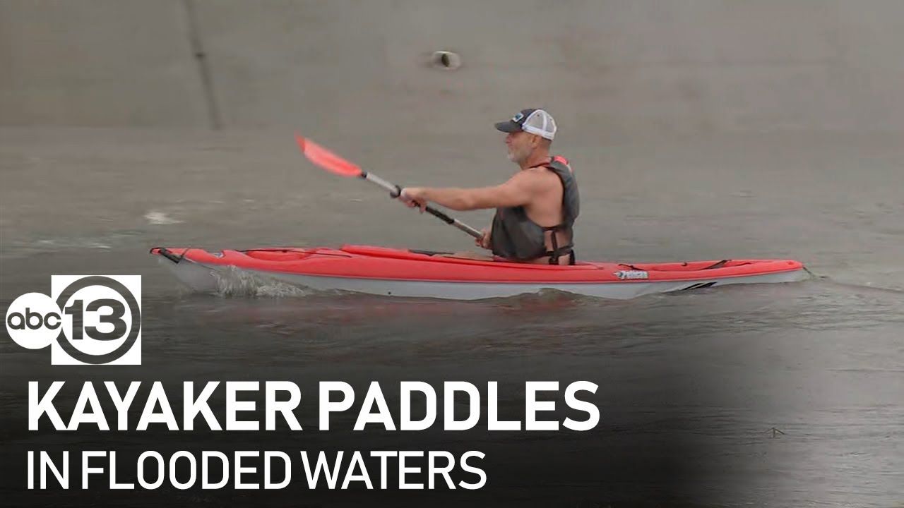 Kayaker paddles in flooded waters near Braeswood in SW Houston YouTube