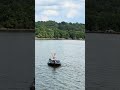 Fisherman and his wife on a boat between maryland and virginia potomac river boat fishing bass