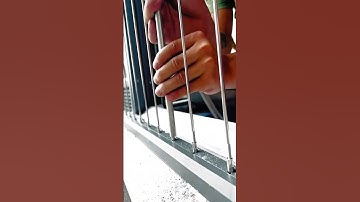 Outdoor balcony and stairway deck rail safety net installation process