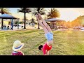 Having fun with gymnastic tricks - Karolina Protsenko with little brother