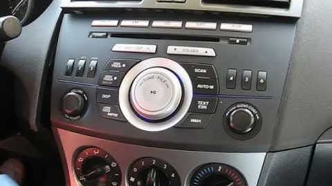 How to Remove Radio / CD Changer / Display from Mazda 3 2010 for Repair.