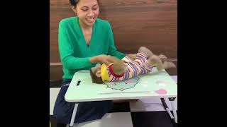 Cute baby monkey ROJO eating sweet mangoes with mommy at home