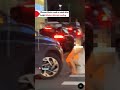 Woman blocks road on stool after bright blinkers disrupt reading