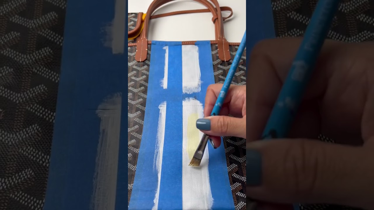 Handpainted initials on Goyard. 