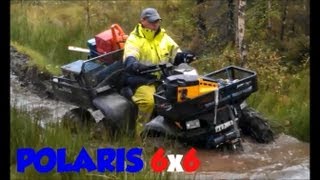 Awesome Polaris 6x6 Sportsman 500 ATV in the woods and in the mud 6 six wheeler with chains