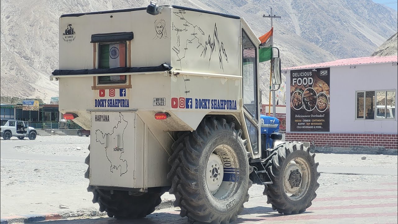 Tractor with mini kitchen with living