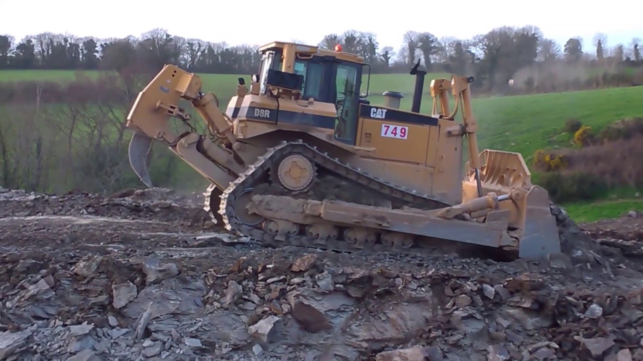 CAT D8 bulldozer working on a road construction site