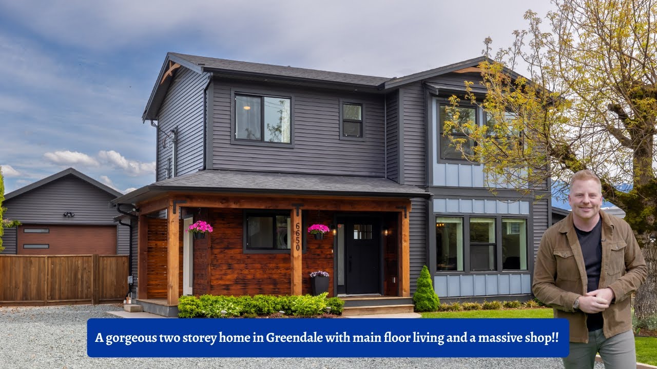 A gorgeous two storey home in Greendale with main floor living and a massive shop!!