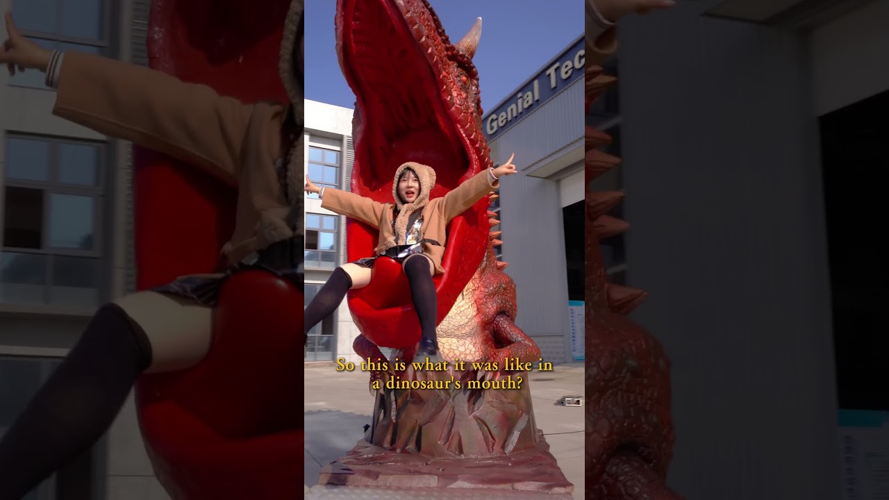 She Can’t Stop Smiling Inside This Animatronic Carnotaurus 🦖