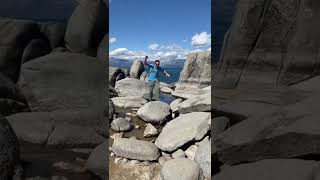Hopping rocks at Zephyr Cove, Lake Tahoe, Nevada.