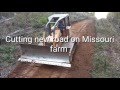 Cutting new road with Bulldozer on Missouri farm