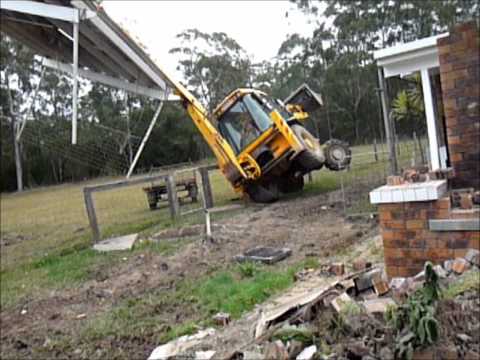 Backhoe Tips Over
