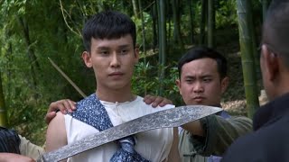 Anti-Japanese Movie! Bandits hold a knife to the lad's neck, but he beats them up with Kung Fu.
