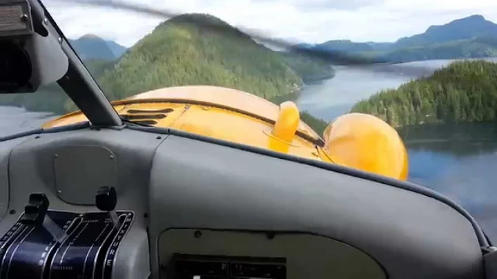 Shane Carlson of Northwest Seaplanes landing a DeH...
