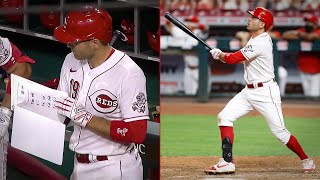 Joey Votto studies his notes, then hits a walk-off double