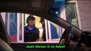 Driver's seat costume, invisible driver, drive-thru worker's reactions.