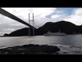 世界遺産・軍艦島から帰路のブラックダイヤモンドと五島フェリー椿 長崎港女神大橋下のすれ違い