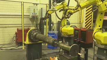 FANUC R30IA TWIN WELDING ROBOTS TWO POSITIONERS with FRONIUS TPS4000 WELDING MACHINES