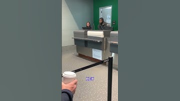 Airport worker LASHED OUT at a group of passengers after their Frontier Airlines flight was delayed