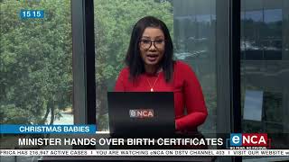 Deputy Minister of Home Affairs hands over birth certificates