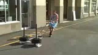 Phelps Training Systems: Backwards Prowler Drag with 320lbs