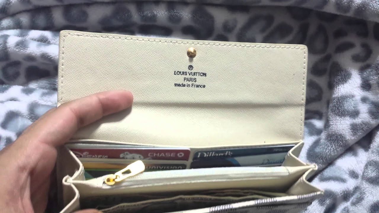 A look at a Louis Vuitton counterfeit Sarah Wallet - YouTube