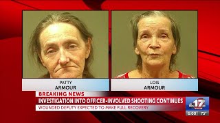 Two arrested in connection with homicide case that led to shooting of 'person of interest'