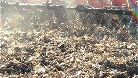 MT865 pulling a Sunflower 4233 with Gates Harrow