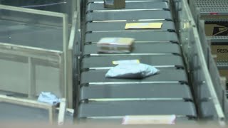 USPS shows how they work to get Christmas packages delivered in time