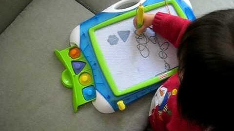 20081208 Vivian drawing leaves