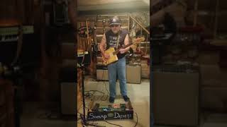 TURN THE PAGE on a WINE BOX GUITAR THIS IS A REMAKE OF A BOB SEGER SONG PLAYED BY TERRY MOJO JOHNSON ON A WINE BOX GUITAR MADE BY MOJO