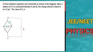 Four identical capacitors are connected as shown in diagram. When a battery of 6 V is
