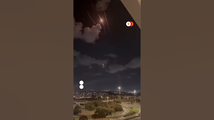 Iranian missile impact in Tel Aviv captured on witness camera | REUTERS