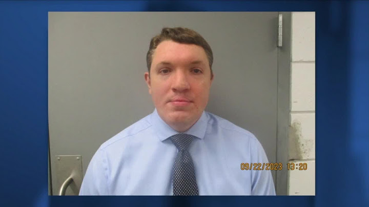 BA police officer charged with cruelty to animals in incident with neighbor's dog